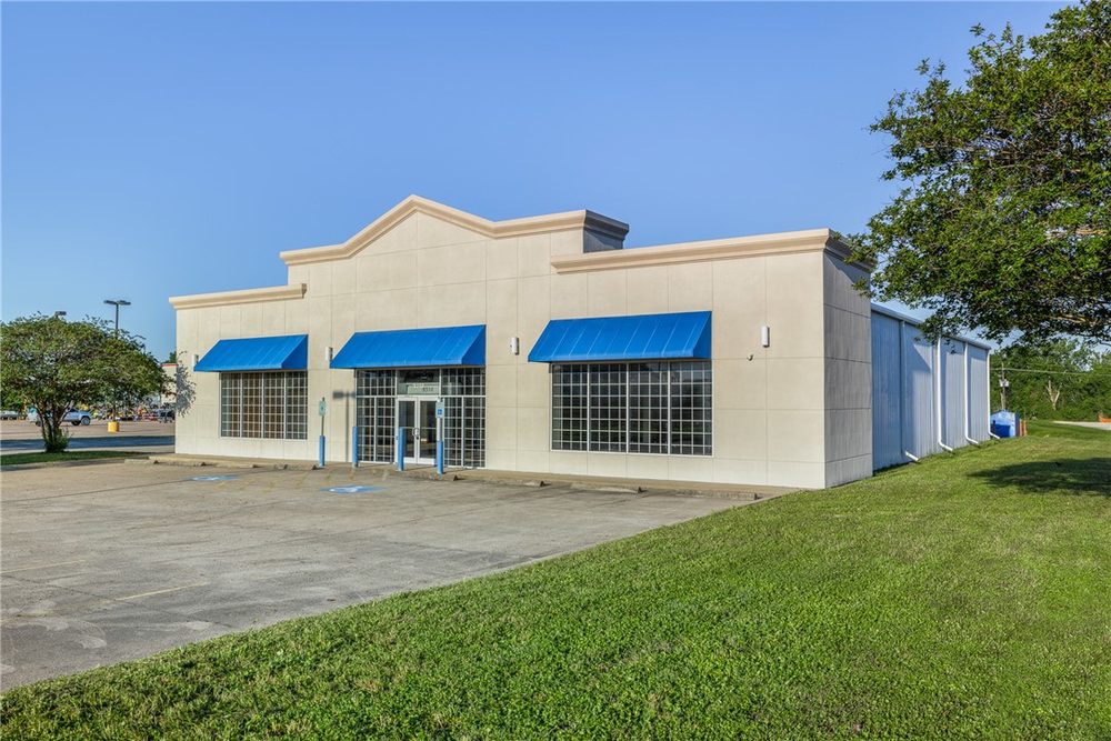 The Byrd EDU Tech Center from the side, with the long building behind its front